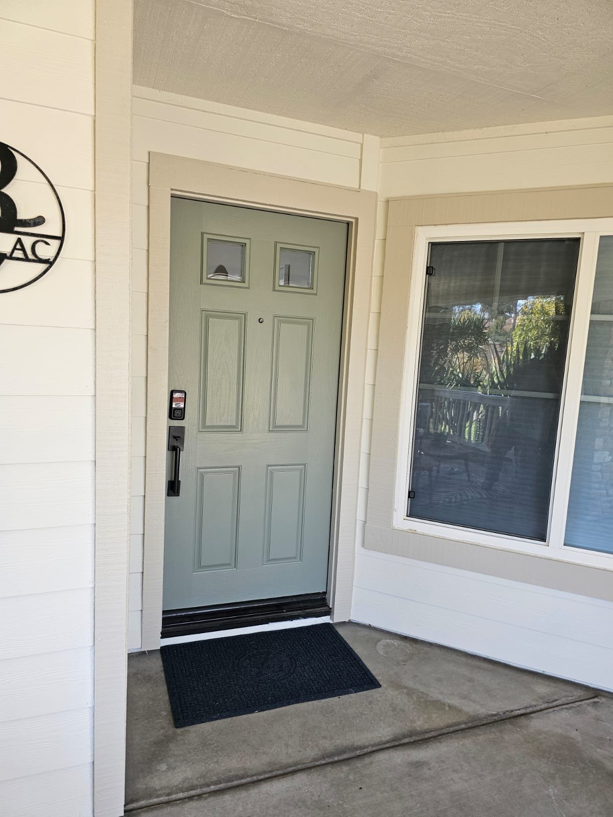 Freshly painted green exterior entry door