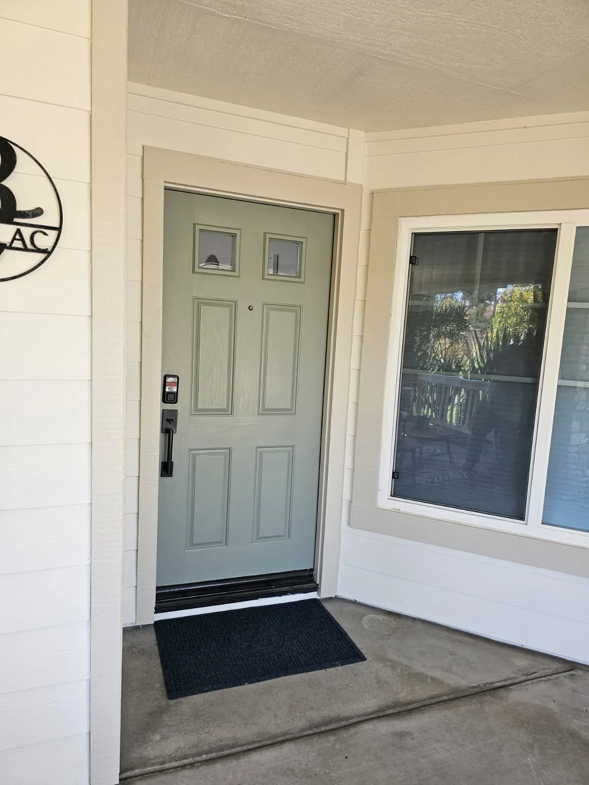 Freshly painted green exterior entry door