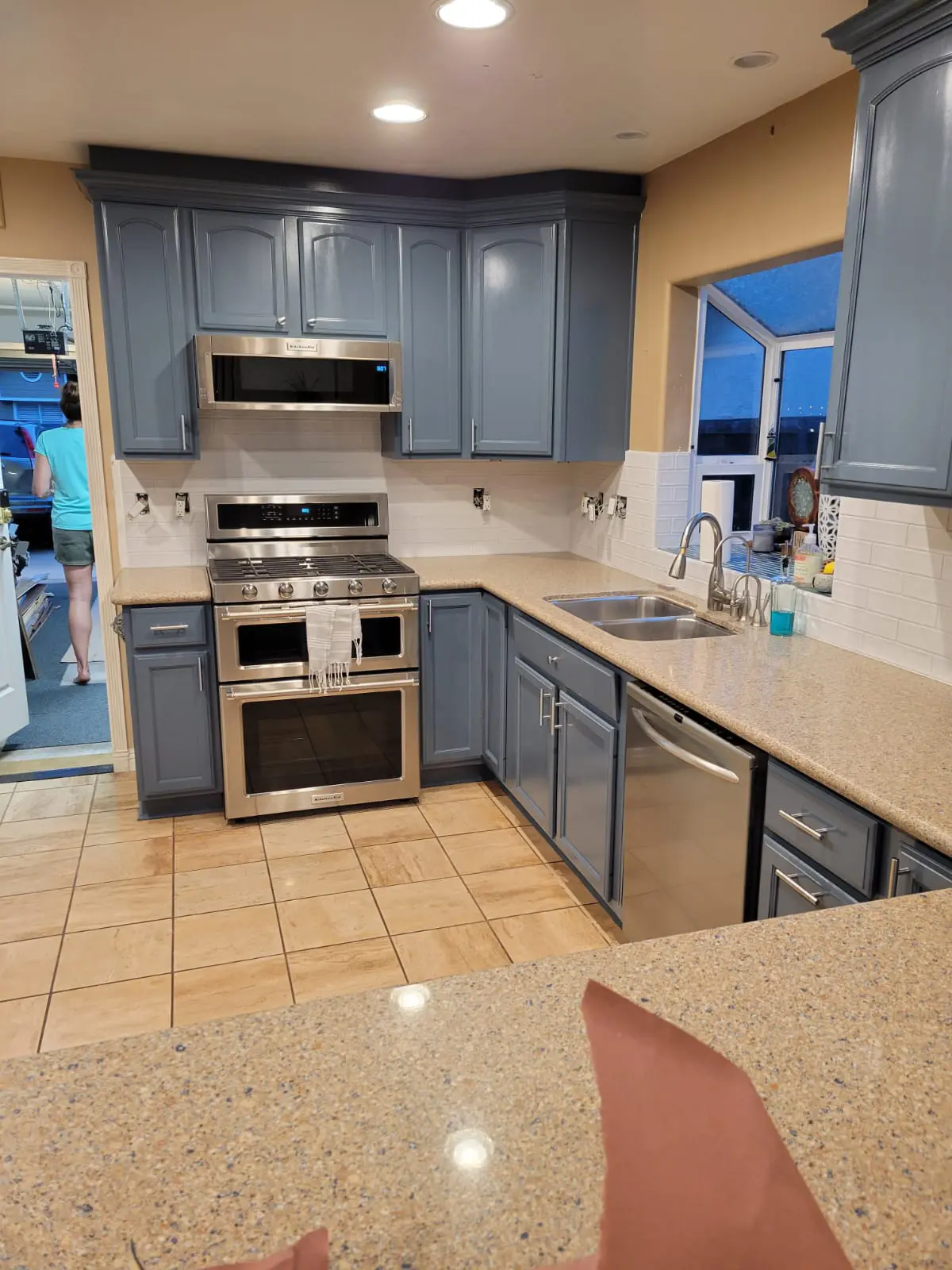 Kitchen cabinets refinished in deep blue