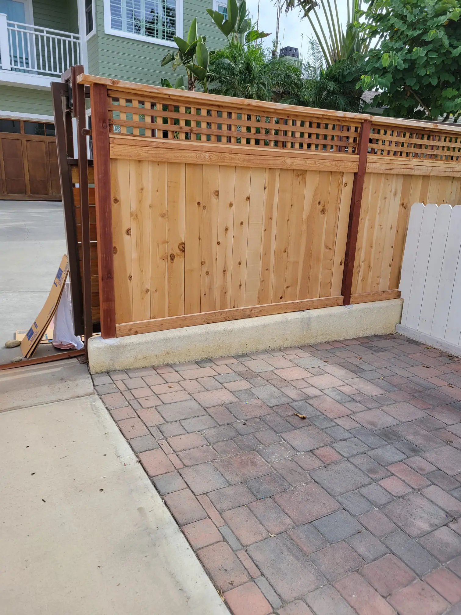 Finished residential fence painting